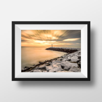 scituate_lighthouse_sunrise_over_cliff_rocks_framed_black_wall_art
