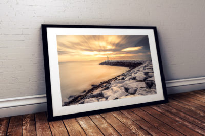 scituate_lighthouse_sunset_over_cliff_rocks_framed_large_black